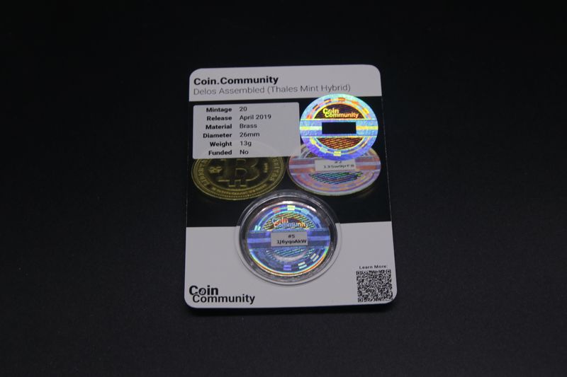 File:Coin.Community - Delos Assembled Carded 5 back.jpg