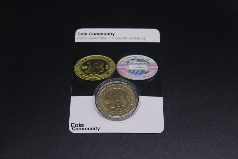 File:Coin.Community - Delos Assembled Carded 2 front.jpg