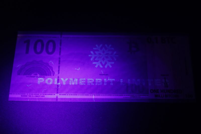 File:Polymerbit - Mystery Note 1 back UV.jpg