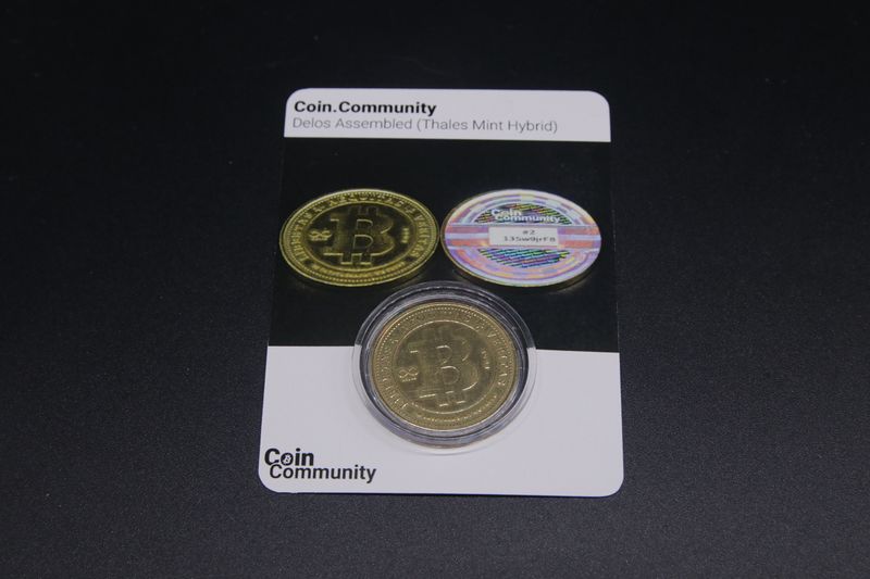 File:Coin.Community - Delos Assembled Carded 4 front.jpg