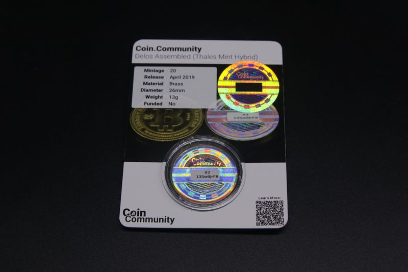 File:Coin.Community - Delos Assembled Carded 2 back.jpg