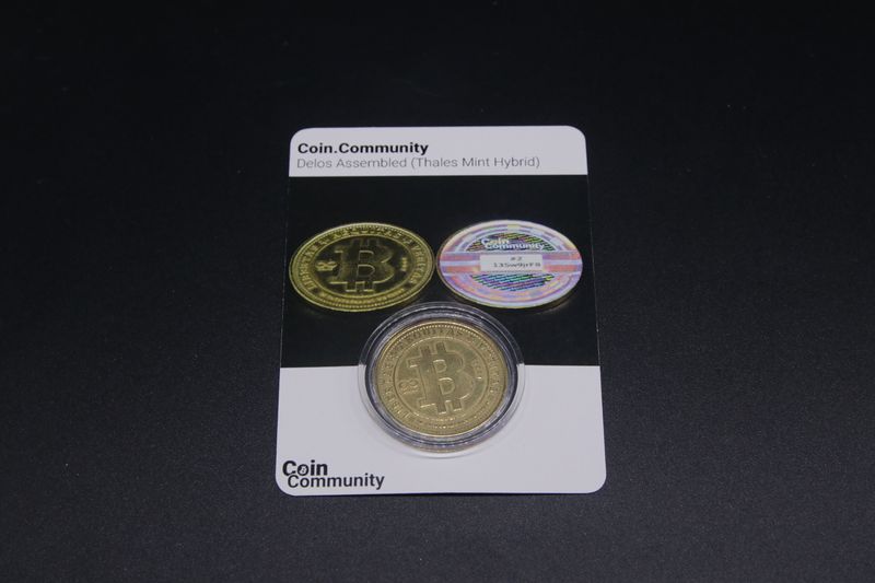 File:Coin.Community - Delos Assembled Carded 5 front.jpg
