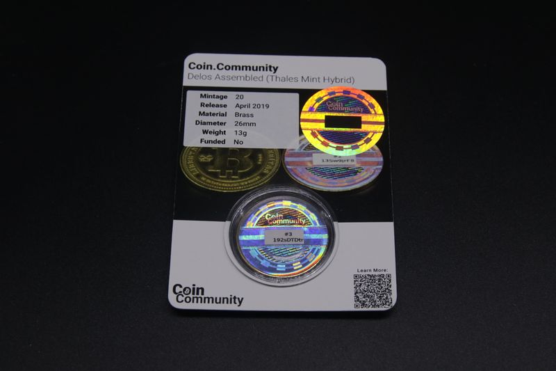 File:Coin.Community - Delos Assembled Carded 3 back.jpg