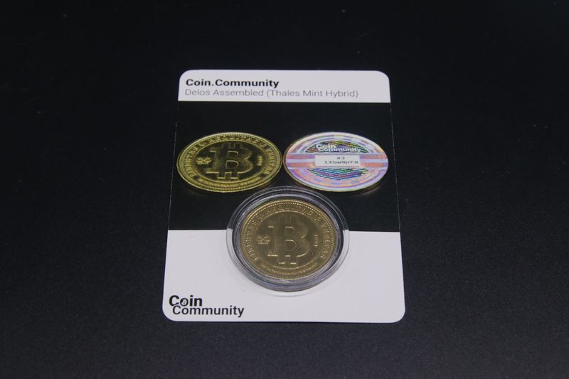File:Coin.Community - Delos Assembled Carded 1 front.jpg